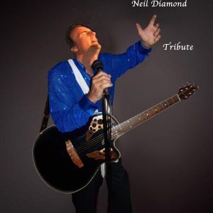 TONY PARADEE AS NEIL DIAMOND